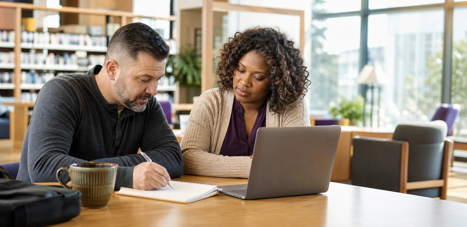A person reviewing career options on a laptop